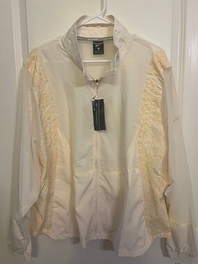 Nike Cream Windbreaker Jacket with Yellow-Pink designs in Panels